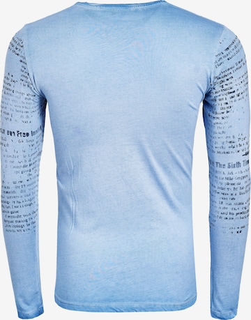 Rusty Neal Longsleeve mit coolem Front-Print in Blau