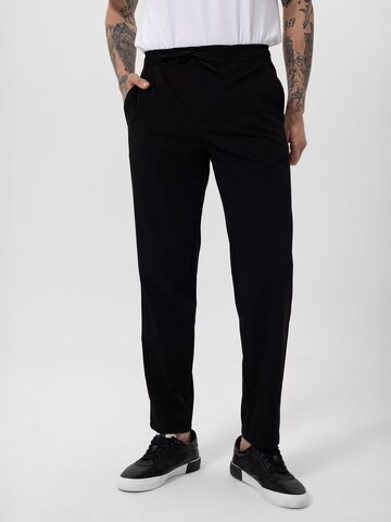 By Diess Collection Regular Trousers in Black: front