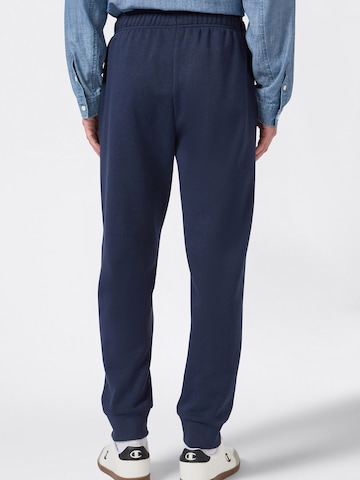 Champion Authentic Athletic Apparel Zwężany krój Spodnie w kolorze niebieski