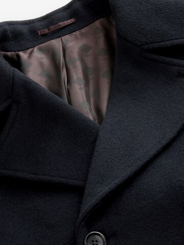 Next Övergångskappa i blå