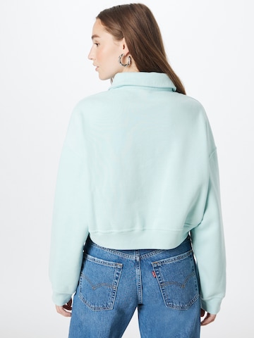 LEVI'S ® Sweatshirt 'Graphic Cropped Stevie' in Blauw