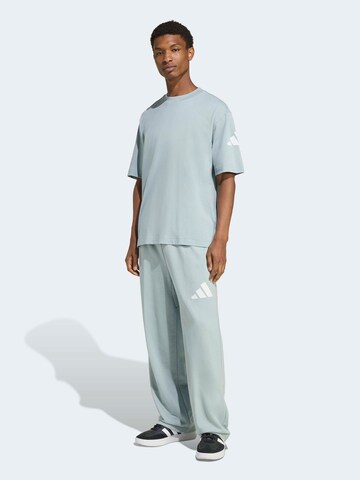 zaļš ADIDAS SPORTSWEAR Vaļīgs piegriezums Sporta bikses 'Essentials'