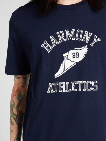 Harmony Paris T-Shirt '89 ATHLETICS' in Blau