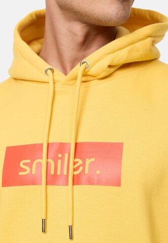 Sweat-shirt 'Buddy' smiler. en jaune