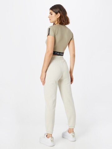 Calvin Klein Sport Zúžený Kalhoty – béžová