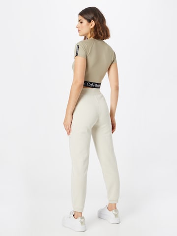 Calvin Klein Sport Tapered Broek in Beige