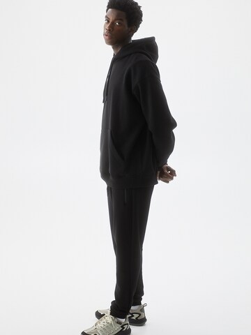Pull&Bear Zwężany krój Spodnie w kolorze czarny