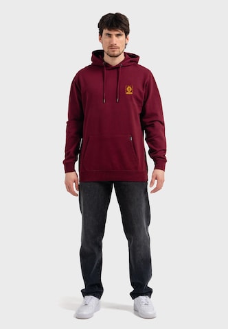 Oldskull Sweatshirt 'Wrldvibe Return to Wild Graphic' in Rood