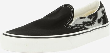 VANS Slip on -tennarit värissä musta: edessä