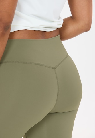 Athlecia Skinny Sports trousers 'Luxe V2' in Green