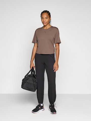 PUMA Tapered Sportbroek 'Cloudspun' in Zwart