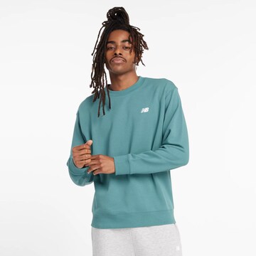 Sweat-shirt new balance en vert : devant