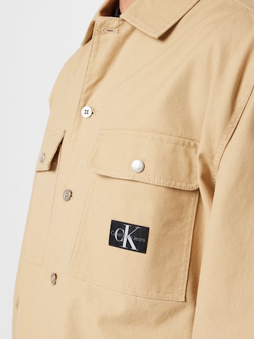 Calvin Klein Jeans Prehodna jakna | bež barva