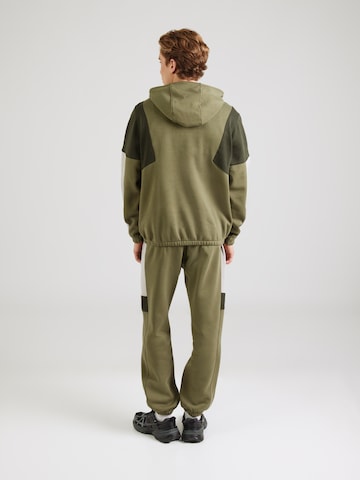 Nike Sportswear Joggingdragt 'CLUB FLEECE' i grøn