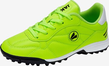 JAKO Soccer Cleats in Green: front