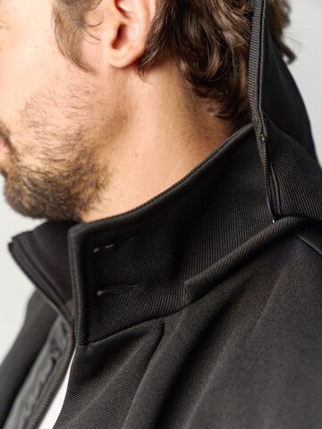 KOROSHI - Chaqueta de entretiempo en negro
