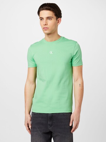 Tricou de la Calvin Klein Jeans pe verde: față