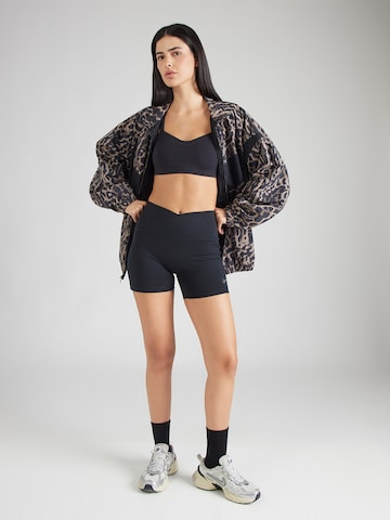 Skinny Pantaloni sport 'ONE' de la NIKE pe negru