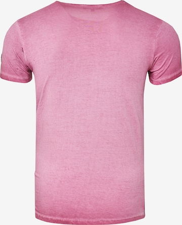 Rusty Neal Cooles T-Shirt mit Allover- Print in Pink