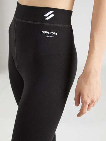 Superdry Normalny krój Legginsy 'ESSENTIAL' w kolorze czarny