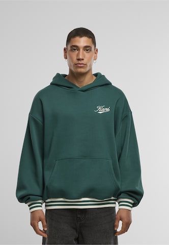 Karl Kani Sweatshirt 'Cursive Varsity' in Grün