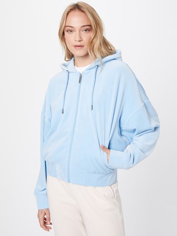 Karl Kani Zip-Up Hoodie in Blue: front