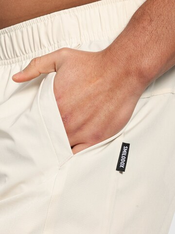 Loosefit Pantalon de sport ' Powerfit Pro ' Smilodox en blanc