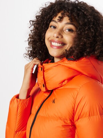 Calvin Klein Jeans Zimní bunda – oranžová