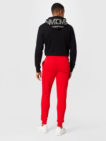 Tommy Jeans Tapered Hose in Rot