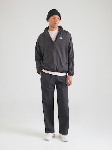 Nike Sportswear Átmeneti dzseki 'WR' - fekete
