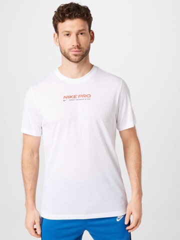 T-Shirt fonctionnel NIKE en blanc : devant