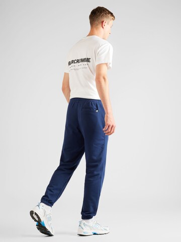 Tapered Pantaloni 'Essentials' de la new balance pe albastru