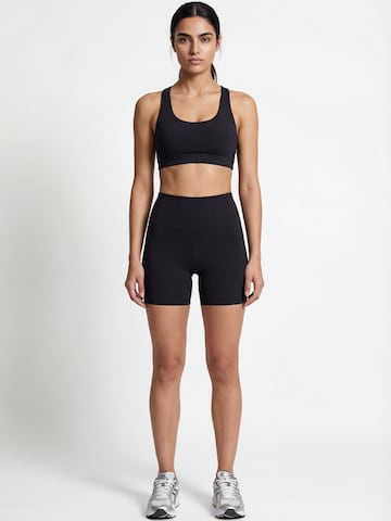 Nomi Active Skinny Workout Pants 'Essential' in Black: front