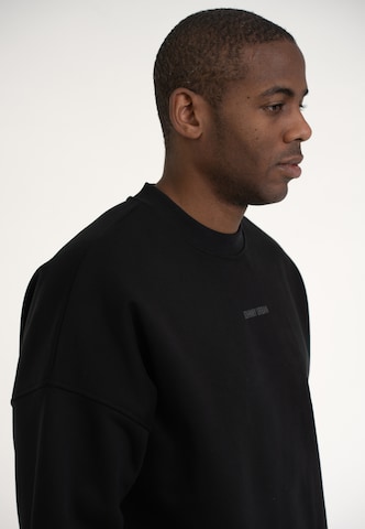 Felpa 'Carter Oversized' di Johnny Urban in nero