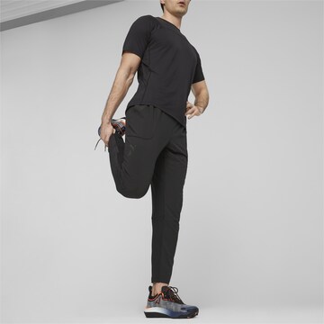 Regular Pantalon de sport 'Seasons' PUMA en noir