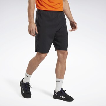 Reebok - Regular Calças de desporto em cinzento: frente