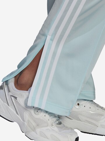 ADIDAS ORIGINALS - Loosefit Pantalón 'Adicolor Classics Firebird Primeblue' en azul