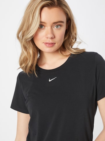 NIKE Funktionsbluse 'One Luxe' i sort