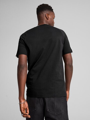 Maglietta 'T7' di PUMA in nero