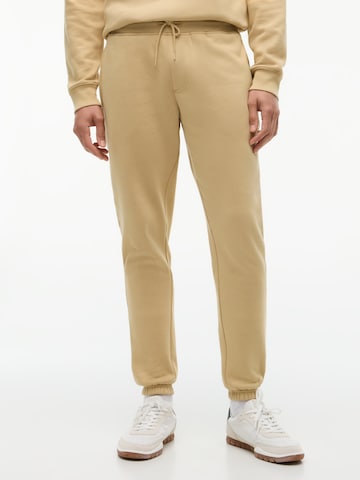 Effilé Pantalon Tommy Jeans en beige : devant