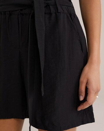 WE Fashion Loose fit Trousers in Black