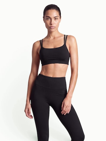 V!BE STUD!OS Bustier Urheilurintaliivit värissä musta: etupuoli
