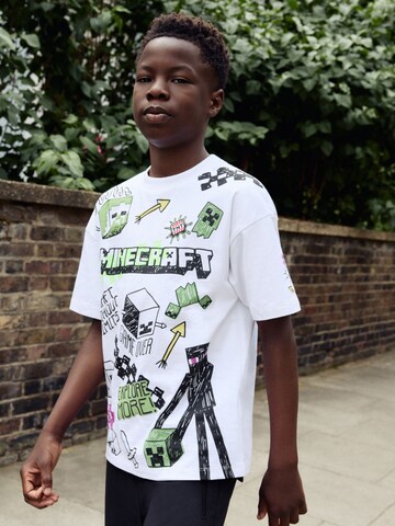 T-Shirt Next en blanc