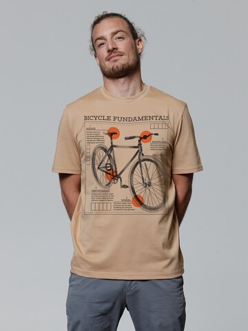 T-Shirt 'Fahrrad Grundlagen' Watapparel en beige : devant