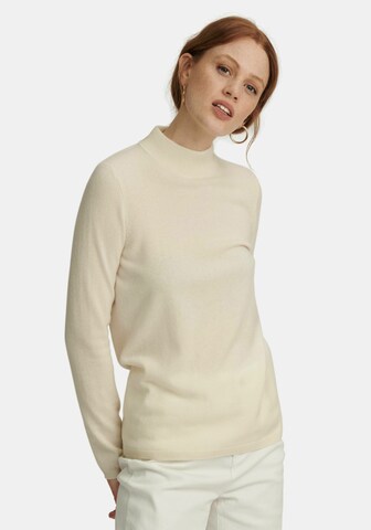 Pull-over include en beige : devant