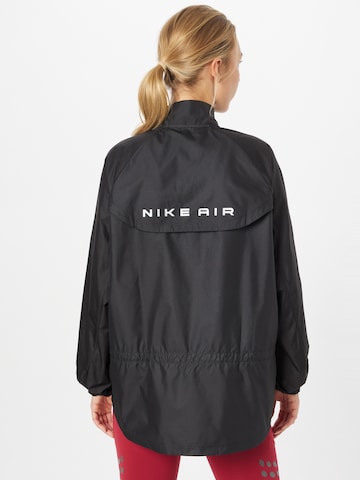 NIKE Sportjacke in Schwarz