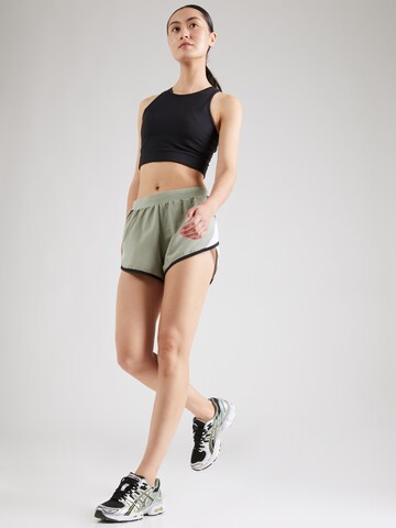 UNDER ARMOUR Skinny Sportbroek 'Fly By 2.0' in Groen