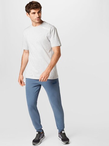 PUMA Tapered Workout Pants in Blue