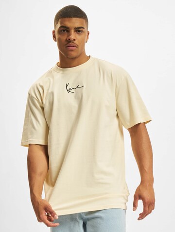 T-Shirt Karl Kani en beige : devant