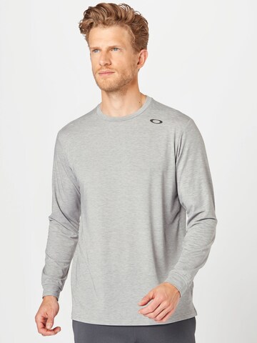 OAKLEY - Camiseta funcional 'LIBERATION SPARKLE' en gris: frente